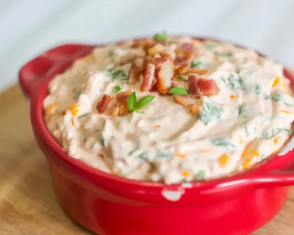 High Protein Crack Dip with Greek yogurt, ranch seasoning, cheese, and bacon.