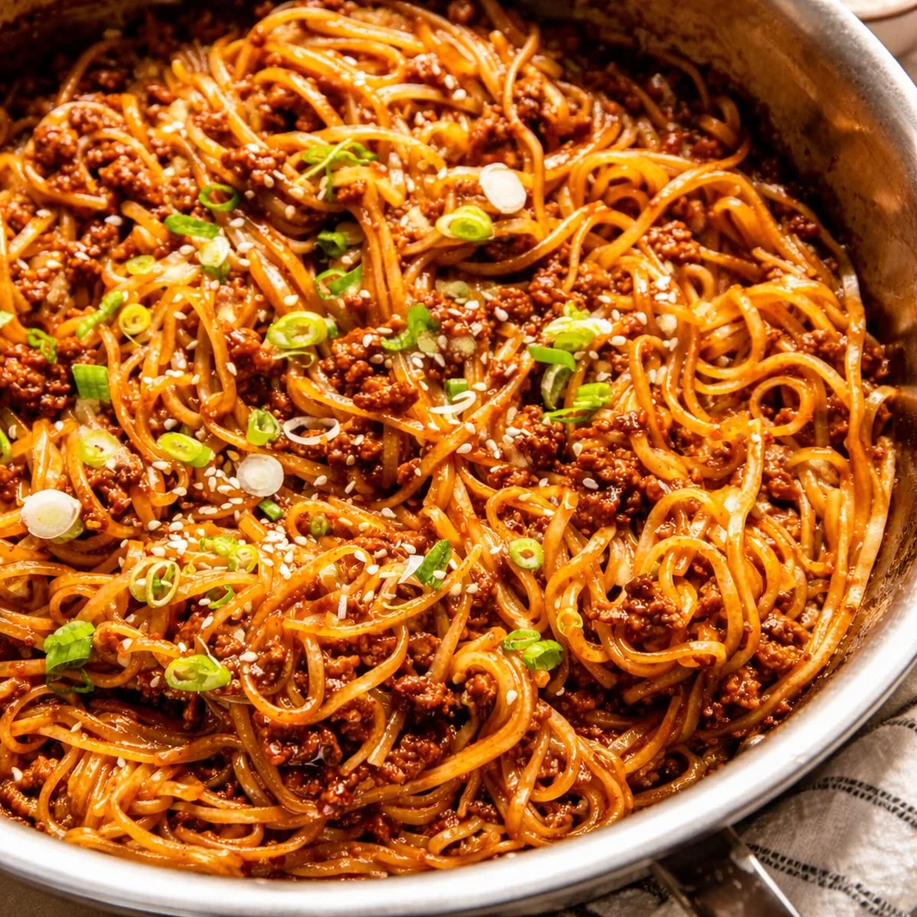 Mongolian Ground Beef Noodles served with green onions on top