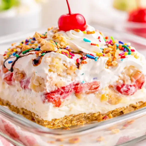 Delicious no-bake Banana Split Dessert layered with cream cheese, bananas, and whipped cream.