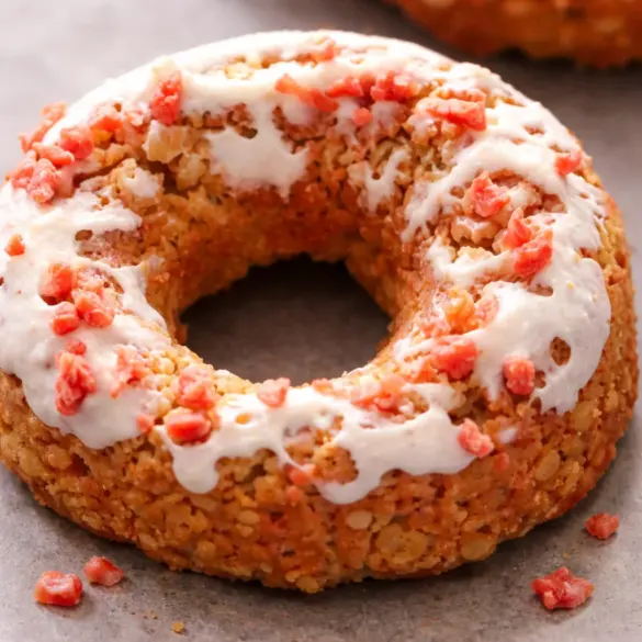 Peanut Butter Dog Donuts topped with carob icing, a tasty treat for your dog