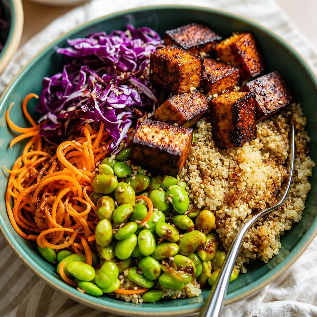 Easy Quinoa Power Bowl high in protein with fresh vegetables for a healthy lunch.