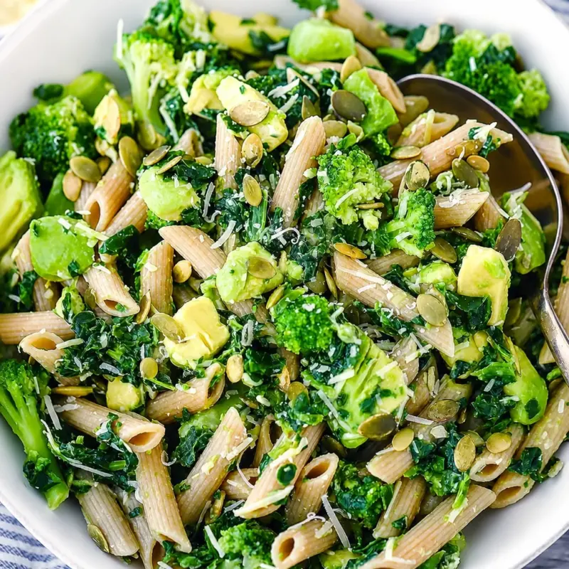 A bowl of Easy Green Goddess Pasta topped with creamy herb avocado sauce.