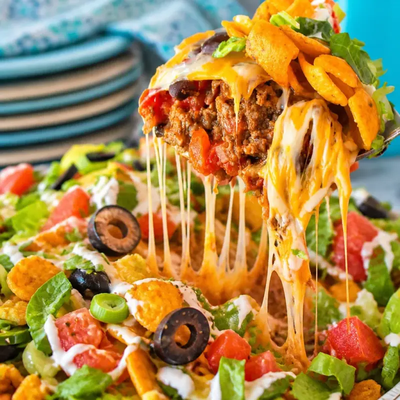 Easy Walking Taco Casserole with Fritos, seasoned beef, and melted cheese