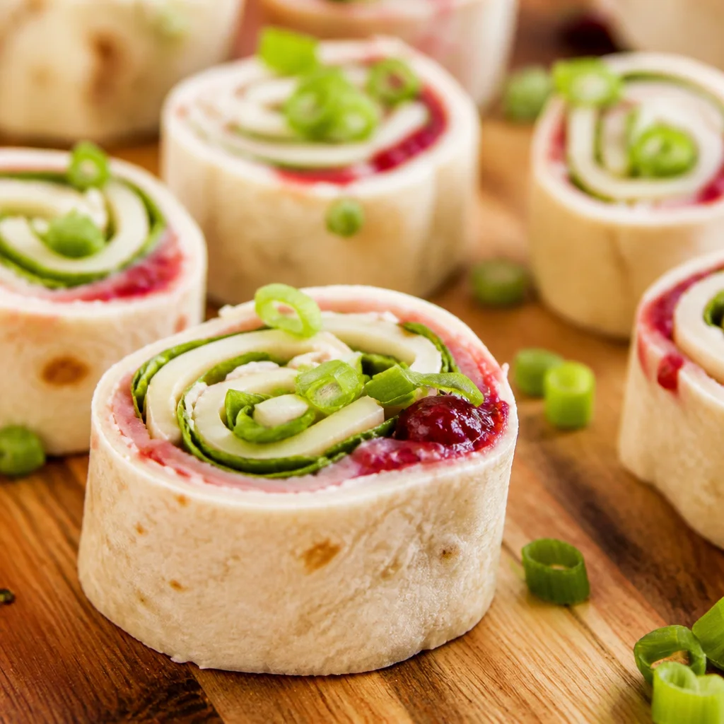 Easy Christmas Appetizers - Cranberry Roll Ups with cream cheese and feta